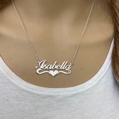 Description: 925 Sterling Silver Name Plate Heart Necklace - Isabella Item No.: C01 Metal Type: .925 Sterling Silver With Stamped 925 Finish: High Polish Measurement: 16" - 18 Inches. Pendant: 1.5" X 0.75" Brand New With Box Classic Heart-shaped Sterling Silver Necklace, Custom Sterling Silver Necklace With Engraved Heart Pendant, Custom Engraved Sterling Silver Necklace With Heart Pendant, Custom Engraved Sterling Silver Heart Pendant Necklace, Silver Heart Necklace With Hallmark, Silver Heart Shaped Necklace With Hallmark, Classic Sterling Silver Jewelry For Valentine's Day, Silver Heart Pendant Jewelry With Hallmark, Silver Engraved Name Necklace As Gift For Her