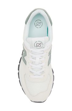 Mixed textures and sporty details wrap a sneaker updated from a retro favorite to a modern kickabout that pairs rugged looks with soft, comfortable cushioning. Removable insole ENCAP® midsole fuses EVA cushioning with a durable, supportive polyurethane shell Textile, synthetic or leather and synthetic upper/textile and synthetic lining/rubber sole Imported New Balance has received the Fair Labor Association accreditation, which signifies that the company has effective systems and procedures in p New Balance High-top Running Sneakers With Translucent Outsole, New Balance Sporty High-top Sneakers With Translucent Outsole, New Balance High-top Sneakers With Translucent Outsole, Sporty New Balance Running Shoes With Rubber Waffle Outsoles, New Balance Mid-top Sneakers With Cushioned Footbed, New Balance Mid-top Cushioned Sneakers, New Balance Sporty Sneakers With Cushioned Footbed, New Balance Sneakers With Translucent Outsole, Sporty New Balance Mid-top Running Shoes