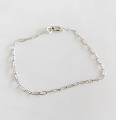 The most beautiful dainty Jenni mini silver paperclip chain! sterling silver Trendy Sterling Silver Oval Link Jewelry, Elegant Silver Chain Paperclip Bracelet As Gift, Classic Silver Chain Bracelet For Everyday, Elegant Silver Chain Link Paperclip Bracelet, Silver Oval Link Chain Bracelet Minimalist Style, Minimalist Silver Chain Bracelet With Sterling Clasp, Silver Bracelets With Rectangular Links For Everyday, Minimalist Silver Bracelet With Lobster Clasp, Silver Minimalist Bracelet With Lobster Clasp