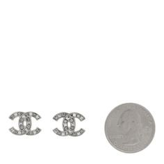 This is an authentic pair of CHANEL Baguette Crystal CC Earrings in Silver and Grey. These classic earrings are crafted of polished silver metal set with small crystals and baguettes. Cc Earrings, Small Crystals, Oversized Bag, Dior Jewelry, Versace Bags, Classic Earrings, November 13, Chrome Hearts, Wallet Fashion