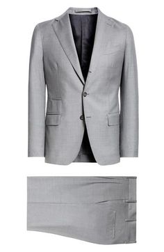 This Italian-crafted suit done in a single-breasted silhouette is tailored from wool and fashioned with notched lapels for a comfortable, polished look. Jacket has three-button closure; notched lapels; chest welt pocket; welt ticket pocket; front flap pockets Trousers have zip fly with button closure; front slant pockets; back welt pockets Partially lined 100% wool Dry clean Made in Italy Designer Clothing Classic Tailored Double Breasted Suit With Hidden Buttons, Classic Tailored Double-breasted Suit With Hidden Buttons, Classic Tailored Three-piece Suit With Long Sleeves, Custom Fit Three-piece Suit With Single Button For Work, Custom Fit Three-piece Suit For Workwear, Classic Double Breasted Suit With Hidden Button Closure, Classic Double Breasted Suit With Hidden Button, Classic Wool Suits For Work, Classic Wool Suit For Work