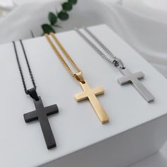 Cool men's cross chain made of stainless steel in silver, gold and black. 💎 Material : Stainless Steel Colors: Gold, Silver, Black Chain length: 60 cm Pendant: 5.5 cm long / 3 cm wide. All pictures of the engravings serve only as examples, each engraving is made individually for you according to your wishes. 💦 Stainless steel does not discolor the skin and is water-resistant, making stainless steel a very easy-care material. 🎁 All of our products come to you lovingly packaged in our elegant a Mens Cross Chain, Necklace With Cross, Elegant Packaging, Mens Cross Necklace, Mens Crosses, Cross Chain, Men Jewelry, Timeless Gifts, Black Chain