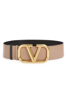 An archival VLOGO buckle boldly brands a smooth calfskin belt that reverses for double the styling options. 2 3/4" belt width; 6" x 3 1/2" buckle Leather Made in Italy Nordstrom Store, Curator Style, Belts For Women, Valentino Garavani, Belt Buckles, Leather Belt, Calf Skin, In Italy, Nordstrom