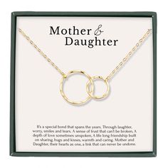 PRICES MAY VARY. MOTHER DAUGHTER BOND: Celebrating the unbreakable bond between a mother and her daughter and make every moment memorable with this heartfelt symbol of love and affection. Our interlocking circles symbolize eternal connection and enduring love. Whether it's to mark a new milestone in motherhood, a gift from daughter to mom, a gift from mom to daughter, a gift to a mom friend -- this necklace is the right choice! GIFT FOR ALL OCCASIONS: Honor the special woman in your life! Our ci Mother And Daughter Necklaces Cheap, Mum And Daughter Necklace, Elegant Cheap Custom Necklace For Mother's Day, Cheap Elegant Custom Necklace For Mother's Day, Mother Daughter Jewelry Ideas, Mother Daughter Bond, Mother Daughter Necklaces, Mother And Her Daughter, Daughter Wedding Gifts