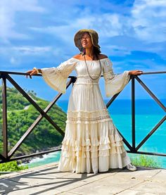 "Long Boho Dress, White Cotton Dress, White Boho Dress 👗 Dive into our versatile and chic Cotton Maxi Dress, designed to embrace your style during warmer seasons. 📏 Sizing: One size fits S to XL (US: 4-14) best for those 170 cm or taller. ✨ Features: - Maxi tiered design with elegant lace trim on each tier, offering various stylish looks. - Elastic top for shoulder coverage or an off-shoulder style with long bell sleeves. - Crafted from 7-8 meters of fabric, providing a graceful, flowing silhouette. 📐 Measurements: Chest: Up to 41\" Pit to pit: 21\" across Under-bust elastic: 28-40\" Armhole: 16\" around Sleeve length: 20\" Waist elastic: 44\" Hip: Free Length: 55\" Hem circumference: 424 cm around 🧼 Care Instructions: 🧊 Hand wash cold, hang dry in shade. 🧺 Machine wash cold or at 30 Boho Tiered Dress, White Fitted Bohemian Beach Dress, Bohemian Dresses For Destination Wedding, Bohemian White Dress For Destination Wedding, Off White Long Sleeve Maxi Dress For Beach, Bohemian Off White Dresses For Vacation, Fitted Off White Bohemian Dresses, Off White Bohemian Dresses For Vacation, Off White Bohemian Vacation Dresses