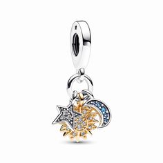 Bring a sprinkling of celestial magic to your jewelry styling with the Two-tone Celestial Triple Dangle Charm. This charm combines three celestial icons: a sun motif in 14k gold plating with sparkling stones and microbeads, a sterling silver star with clear pavé and a sterling silver crescent moon with deep blue stones. Wear it as a symbol of balance and harmony, in the cosmic dance of the universe and within ourselves. White Gold Celestial Jewelry With Charms, Celestial White Gold Jewelry With Charms, Sparkling Celestial Sterling Silver Jewelry, Celestial Jewelry With Dangling Charms, Pandora Charms Gold, Pandora Bracelet Charms Ideas, Pandora Bracelet Designs, Charms Pandora, Bracelet Pandora