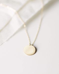 Material: Sterling Silver; Finish: Hammered Classic Jewelry With Round Pendant For Everyday, Classic Everyday Jewelry With Round Pendant, Minimalist Round Disc Jewelry With Coin Pendant, Minimalist Everyday Charm Necklace With Coin Pendant, Everyday Minimalist Charm Necklace With Coin Pendant, Minimalist 14k Gold-filled Medallion Necklace, Minimalist 14k Gold Filled Medallion Necklace, Minimalist Hammered Pendant Jewelry, Everyday Hammered Medallion Jewelry