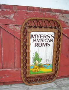 a sign on the side of a building that says myer's jamaican rumps