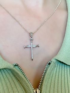 "Express your faith and beliefs with this one of a kind, beautiful piece of jewelry. Cross pendant is made of solid 925 sterling silver and comes with matching 925 sterling silver chain.   Its modern and slick design with inner crossing nails is timeless. The nails are also known to represent the passion of the Christ for people. The sparkle of the perfectly set cubic zirconia stones along the cross, is rich and elegant. The cross has a pretty good weight to it.  Cross pendant measures to 1.375\ The Passion Of The Christ, Passion Of The Christ, Christ Cross, Jewelry Cross, Necklace Cross, The Cross Of Christ, Religious Symbols, Cross Jewelry, 925 Sterling Silver Chain