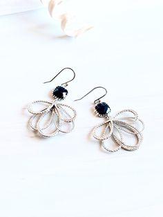 Elegant Pierced Teardrop Earrings For Party, Nickel-free Black Jewelry For Wedding, Silver Hoop Earrings With Elegant Design As Gift, Silver Hoop Earrings With Elegant Design, Nickel Free Elegant Chandelier Earrings For Anniversary, Elegant Crystal Earrings Designed As A Gift, Nickel-free Black Wedding Jewelry, Nickel-free Elegant Chandelier Earrings For Anniversary, Elegant Round Flower Earrings Pierced