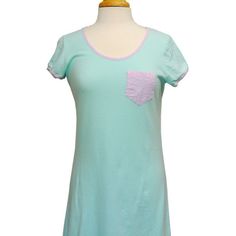 Classic Tee Style Dress In Robins Egg Pique With Contrast Trim And Pocket In Hot Pink Seersucker. Proudly Made In North Carolina. Fabric & Care Instructions: 100% Pique Cotton. Machine Washable. Hang To Dry Or Tumble Dry Low. Measurements Are: 20" Underarm To Underarm 18.5" Across The Waist 37" Length Light Blue Short Sleeve Summer Sleepwear, Cotton Short Sleeve Dress For Sleepover, Light Blue Short Sleeve Top For Sleepover, Pink Short Sleeve Loungewear Dress, Light Blue Cotton Short Sleeve Sleepwear, Blue Short Sleeve Sleepwear For Spring, Pink Short Sleeve Dress For Loungewear, Light Blue Cotton Loungewear Dress, Light Blue Cotton Lounge Dress