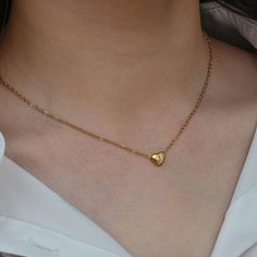 Personal and sweet, the Sweetheart Initial Necklace is the perfect piece to gift someone. The dainty profile of the heart pendant makes this a stunning piece to wear alone, or layer with other pieces, like the Zodiac Name Plate Necklace. DETAILS & SIZE Finish: 18k gold plate Material: Stainless steel Measurements: Pendant: 7x8mm; Chain: 16" Lobster claw clasp Waterproof, tarnish-resistant, hypoallergenic, nickel free Shop the Personalized Collection! Or shop Necklaces for more options to layer t Gold Initial Necklace, Custom Initial Necklace, Letter Pendant Necklace, Dainty Pendant, Initial Necklace Gold, Initial Pendant Necklace, Gold Initial, Mini Heart, Letter Pendants