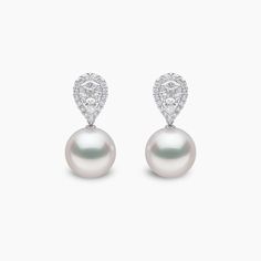 Embrace elegance with our captivating Glitz Earrings, showcasing a remarkable array of pear-cut diamonds set in 18k white gold, each adorned with a halo of diamonds. Below, a lustrous white South Sea pearl adds a touch of refinement. Elevate your ensemble with the exquisite allure of these earrings.  Pearl Size: 14-15mmMetal:18K White GoldApproximate Diamond Weight: 1.91cts Glitz Earrings, Rare Pearls, Jewellery Brand, Pear Cut Diamond, Pearl Jewellery, Yoko London, Sea Pearl, Earrings Pearl, Pearl Types