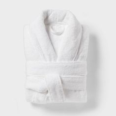 Make every day feel like a spa day by wrapping yourself in this Spa Plush Bath Robe from Threshold™. Crafted from 100% terry cotton and featuring a plush design, this V-neck bathrobe feels soft against your skin as you bundle up after a shower. Designed in a solid white hue, it features an open-front design with a shawl collar for easy on and off. A front tie with belt loops offers you a customizable fit, while two large front pockets come in handy for keeping your phone or grooming essentials c Terry Cloth Bathrobe, Black Flower Dress, Terry Robe, Plush Design, Target Gifts, One Piece Clothing, One Piece Pajamas, Spa Day, Shawl Collar