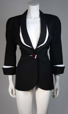 For Sale on 1stDibs - This fabulous Thierry Mugler ensemble is comprised of medium weight wool gabardine with a dramatic sculpted white lapel and cuff detail in white satin. White Skirt Suit, Black And White Skirt, Thierry Mugler, Cuff Detail, White Satin, Skirt Suit, White Skirts, Satin, Cuff