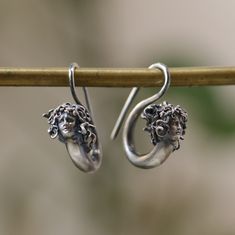 Medusa Earring 925 Silver, Witch Medusa Jewelry, Snake Jewelry,, Handmade Earring, Mythological Jewelry, Greek God, Earring Antique Silver This is made with 925 Silver material. Let's not forget that it is handmade. There may be minor differences. It can be made with other materials. You can send a message. If you have any questions, please feel free to contact me, we are happy to help. Your jewelry will be packed in a luxury jewelry box ready to be given as a special gift. Visit my shop to view Unique Sterling Silver Pierced Earrings, Hallmarked Sterling Silver Drop Plug Earrings, Symbolic Sterling Silver Drop Earrings, Silver Symbolic Earrings For Jewelry Making, Symbolic Silver Earrings With Ear Wire, Sterling Silver White Gold Earrings, White Gold Sterling Silver Earrings With Hooks, Unique White Gold Pierced Earrings, Symbolic Sterling Silver Pierced Earrings