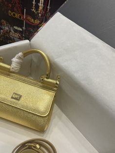 Description D.G Small Sicily Bag In Dauphine Gold For Women 7.5in/19cm DG Rep 1:1 Size: 19 x 13 x 6 cm / 7.5 x 5.1 x 2.3 inches (Length x Width x Height) Front flap with hidden magnetic fastening Branded plate featuring two metal plating finishes Top handle and adjustable, detachable strap in Dauphine Printed fabric lining and flat pocket Item comes with a branded dust bag Includes box, dust bag. This product is of the best quality. Sicily Bag, Gold For Women, Louis Vuitton Shirt, Stylish Handbags, Gucci Gg Marmont, Fall Earrings, Luxury Products, Evening Clutch Bag, Girls Bags