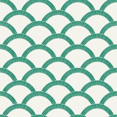 a green and white pattern with wavy lines