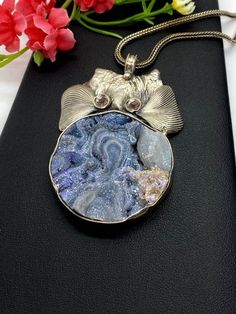 "Artisan Rainbow Druzy pendant comes with 20\" silver chain Hand-made Sterling Silver 925. Stones used: Rainbow Druzy, Pink Tourmaline. Height -2 1/2\" (including bail), Width - 1 3/4\" Height - 65mm (including bail), Width - 45mm Unique Handcrafted One-of a-kind Design Pendant Each Piece of Jewelry in my Collection is Absolutely One of a Kind! When you start wearing a piece of my jewelry you will fall in love with it more and more each day and feel that good Energy and Love that I pass into it Silver Necklace With Large Pendant For Gift, Silver Jewelry With Stones For Gift, Silver Custom Necklace With Large Pendant For Gift, Sterling Silver Jewelry With Large Healing Pendant, Silver Medallion Custom Necklace For Gift, Unique Silver Necklace With Round Pendant, Artisan Sterling Silver Necklace For Gift, Unique Sterling Silver Necklace For Gift, Unique Sterling Silver Necklace As Gift