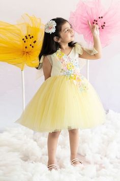 Lemon yellow tie-up sleeves fluffy tulle dress with colorful 3D floral applique along with delicate organza butterflies, pearls highlights and pearl lining on the neckline. - Aza Fashions Yellow Princess Dress For Spring Dress-up, Spring Floral Embellished Dress For Dress-up, Spring Floral Embellished Dress, Yellow Tulle Dress For Dress-up Occasions, Yellow Tulle Formal Dress, Yellow Tulle Dress For Spring, Spring Yellow Tulle Dress, Playful Floral Embroidery Dress For Spring, Playful Floral Embroidery Spring Dress