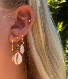 Puka Shell Earrings - Etsy Seashell Jewelry Diy Earrings, Puka Shell Earrings, Beach Earrings Aesthetic, Beach Piercings, Beach Earring Stack, Granola Earrings, Gold Shell-shaped Hoop Earrings, Gold Shell-shaped Hoop Earrings For Pierced Ears, Lexi Hidalgo Jewelry