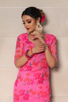 Prepare to get overwhelmed with a swirl of compliments by dressing yourself in this beautiful Printed chiffon kurta suit set. With chiffon floral print dupatta and straight silhouette, Pair it with beautiful statement earrings and traditional juttis. SKU#: 11403216PK Disclaimer: There may be slight difference in actual product color compared to product images. Chiffon Kurta, Chiffon Suit, Chiffon Floral, The Cosmos, Floral Chiffon, Suit Set, Product Images, Cosmos, Statement Earrings