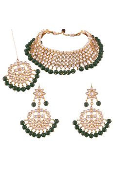 This set consists of Necklace, Earrings and Maang Tikka. Perfect accessory for every jewelry box. Product Features: Color: Green Material: Alloy Occasion: Wedding Product Weight: 50 grams Product Dimensions: 3 cm Height x 4 cm Breadth x 6 cm Length Indian Wedding Jewelry Sets, Choker Style Necklace, Pearl Jewelry Wedding, Maang Tikka, Diamond Necklace Set, Wear Necklaces, Choker Necklace Set, Indian Wedding Jewelry, Wedding Jewellery