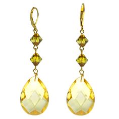 Fashionable & stunning, these Teardrop crystal drop earrings offer a classic glamour that's sure to catch attention. Features rondel & pear shape briolette glass crystals on 14k gold dipped euro wire. Available in Brown, Dark Blue, Yellow (Topaz), Dark Green (Olivine) And Dark Purple Measurements: 2.7"L x 0.71"W 1928 JEWELRY COLLECTION From the vaults of rich European capitals to the antique laden attics of old American estates, 1928 Jewelry has created modern replicas of the most beautiful, exq Channel Jewelry, Whistle Necklace, Bead Drop Earrings, Classic Glamour, Green Topaz, Antique Locket, 1928 Jewelry, Vintage Inspired Jewelry, Beaded Drop Earrings