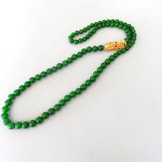 This Beaded Necklaces item is sold by FineFindsByMarie. Ships from Celina, TX. Listed on Jan 31, 2024 Long Necklace Gold, Crystal Eyes, Crystal Eye, Gold Long Necklace, Jade Necklace, Red Crystals, Green Jade, Beaded Necklaces, Jade Green