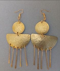 The earrings are  made with a lot of love and care from brass.  The are  beautifully designed for you, sister, mother, relative or a friend. The are light in weight and comfortable to wear. **This listing is for one pair of earrings.** Buy multiple items pay shipping for one the rest ships free. Custom orders are welcome. For more earrings, follow the link. https://www.etsy.com/listing/922901690/brass-wholesale-earrings-african?ref=shop_home_active_10 **Happy shopping** Dhl shipping express Thank you. Cheap Brass Jewelry With Matching Earrings, Luxury Brass Earrings For Ceremonial Occasions, Affordable Symbolic Brass Earrings, Cheap Traditional Brass Jewelry, Cheap Unique Brass Earrings, Unique Cheap Brass Earrings, Cheap Brass Jewelry For Festivals, Cheap Traditional Brass Earrings, Bronze Brass Drop Chandelier Earrings