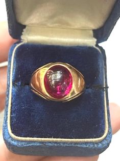 Beautiful Vintage 14k Gold Red Spinel Ring in a cabochon shape. It is hallmarked 14k.  Weight: 8.34  grams Ring US size: 6 1/4  (it can be resized upon request)  Very good antique conditions. Thank you for visiting Boudoir Vintage!   Please feel free to contact me for further information or photos.  I offer international shipping. Your item will be packed with extreme care and will be shipped within 3-5 working days. If you are dissatisfied with your item, please feel free to contact me and would be happy to assist.  If you are interested in paying in installments or reserve an item, please send me an inquiry. To continue visiting my shop, please visit  https://www.etsy.com/shop/BoudoirVintageBijoux/ FOLLOW ME on Instagram: https://www.instagram.com/boudoir_vintage/ Red Spinel Ring, Red Spinel, Spinel Ring, Cabochon Ring, Rings Statement, Red Gold, Statement Rings, Jewelry Rings, Size 6