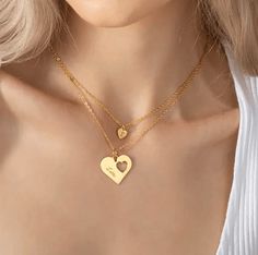 Cherished Bonds - Mother-Daughter Heart Necklace Set Unite Hearts with Elegant Style Heartfelt Connection - Discover the essence of maternal love with our Mother-Daughter Heart Necklace Set. This exquisite collection features two heart-shaped necklaces, meticulously crafted to symbolize the unbreakable bond between a mother and her daughter. It's not just jewelry; it's a tribute to love, making it an ideal accessory for mother-daughter moments. Sophisticated Elegance - Each heart pendant boasts Trendy Cheap Heart Necklace For Mother's Day, Cheap Trendy Heart Necklace For Mother's Day, Cheap Heart-shaped Jewelry For Mom, Cheap Necklaces For Women For Mother's Day, Cheap Customizable Necklaces For Mother's Day, Cheap Elegant Custom Necklace For Mother's Day, Engraved Necklace Mothers, Mother And Her Daughter, Outfit Elegant