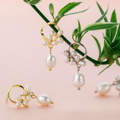 An elegant pair of floral pearl earrings features a baroque pearl dangle tear drop on dainty stud earrings, comes in gold or silver color. These elegant pearl drop earrings are perfect wedding jewelry gift, simple bridal earrings, or everyday earrings gift for your love one. Materials are solid 925 sterling silver with gold plate or platinum plate and pearls. *Pearls are natural so shape and size maybe vary a little bit. Jewelry Care: See more information about how to care for your jewelry here. Silver Pearl Drop Earrings With Intricate Design, Sterling Silver Flower Earrings With Pearl Drop, Silver Flower Shape Pearl Drop Earrings, Silver Intricate Dangle Pearl Earrings, Simple Bridal Earrings, Silver Pearl Drop Flower-shaped Earrings, Bridal Pearl Earrings, Dainty Studs, Bridal Earrings Pearl