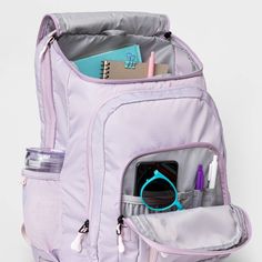 The Jartop Elite Backpack from Embark™ is the only backpack your kid will ever need. This softside backpack features a spacious main compartment with interior accessory, mesh and laptop pockets, as well as three exterior zip pockets, providing them with loads of space for binders, electronics and other school supplies. It even has a mesh side pocket that's perfectly sized for holding water bottles, their glasses case and more! The adjustable straps allow for comfortable, customizable carrying, a Purple Nylon Student Backpack, School Backpack With Mesh Pockets, Functional Purple Sports Backpack, School Backpack With Mesh Pockets And Nylon Material, Functional Purple Nylon Backpack, Purple Nylon Backpack For Back To School, Back To School Purple Nylon Backpack, Back-to-school Travel Backpack With Mesh Pockets, Back To School Backpack With Mesh Pockets