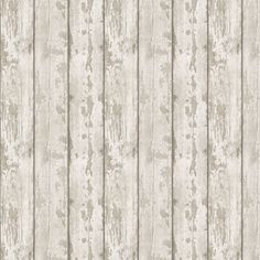 an old wooden wallpaper with peeling paint on it's sides, in grey and white