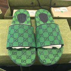 This Is An Authentic Pair Of Gucci Canvas Gg Monogram Slide Sandals 10 In Green And Blue. These Stylish Sandals Are Crafted Of Gucci Gg Monogram Canvas In Green And Blue. It Features A Matching Toe Strap With A 1.5 Inches Platform Soles. Designer Green Open Toe Sandals, Designer Slip-on Sandals With Branded Insole, Blue Leather Gucci Sandals, Designer Cushioned Slides Slip-on, Designer Cushioned Slip-on Slides, Luxury Gucci Slides With Rubber Sole, Luxury Gucci Slip-on Slides, Designer Green Sandals With Round Toe, Gucci Blue Leather Sandals