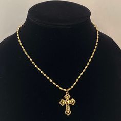 "The Heart Cross Necklace 🤍 Featuring a unique gold cross with heart details and an 18k gold plated stainless steel oval ball chain. shower proof!  Unisex & tarnish proof- 16\" 🖤 each will come with an extender for adjustability.  Made with love 🫶" Big Gold Cross Necklace, Gold Metal Cross Necklace With Adjustable Chain, Gold Cross Necklace With Chain As Gift, Gold Cross Figaro Chain Necklace, Gold Figaro Chain Cross Necklace, Gold Figaro Chain Necklace With Cross Pendant, Gold Figaro Chain Necklace With Cross Shape, Gold Cross Necklace With Figaro Chain As Gift, Gold Cross Necklace With Figaro Chain For Gift