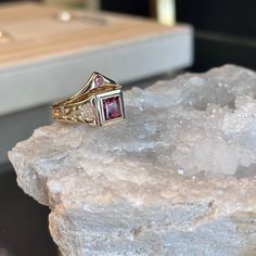 Featuring a 6mm princess cut Fair Trade Garnet or Oregon Sunstone, the engraved Evening Rose ring was originally designed as a pinky ring, but looks great on any finger. Band tapers from 9mm to 4mm. *Contact us for custom stone and sizing - price may vary - info@talonnyc.com 14k Gold Asscher Cut Ring With Center Stone, Luxury Ruby Ring With Vvs Clarity And Emerald Cut, Luxury Sapphire Ring With Accent Stones, Square Cut, Luxury Emerald Cut Ruby Ring With Vvs Clarity, 14k Gold Radiant Cut Sapphire Promise Ring, Promise Princess Cut Birthstone Ring, Heirloom Rectangular Brilliant Cut Rings, Yellow Gold Sapphire Ring With Princess Cut, Luxury Gemstone Signet Ring For Promise