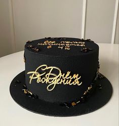 there is a black cake with gold lettering on the top and bottom that says, don't be forgotten