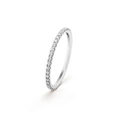 Van Cleef & Arpels - Félicité wedding band, 1.25 mm - Ring Woman White gold/Diamond - Born out of the marriage between Alfred Van Cleef and Estelle Arpels, the Maison goes hand in hand with stories of love. Félicité wedding band 1.25 mm, rhodium plated 18K white gold, round diamonds Van Cleef & Arpels, Small Rings, Van Cleef Arpels, Van Cleef, High Jewelry, White Gold Diamonds, Rhodium Plated, Wedding Band, Women Rings