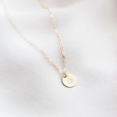 The daintiest initial necklace, available in 14k gold fill or sterling silver. It's the perfect personalized gift for anyone -- perfect as a bridesmaid necklace, friend's birthday necklace, or anyone else you love! Dainty, personal, and minimal. Find more at Simple & Dainty. Dainty Charm Necklaces With Initial Pendant For Everyday, Delicate Everyday Charm Necklace With Initial Pendant, Delicate Everyday Charm Necklaces With Initial Pendant, Delicate Everyday Necklace With Initial Pendant, Everyday Tiny Initial Pendant Charm Necklace, Simple Charm Necklaces For Mother's Day, Minimalist Jewelry With Delicate Chain And Initial Pendant, Delicate Charm Necklaces For Bridesmaid Gift, Minimalist Tiny Charm Necklaces For Mother's Day