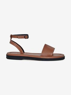 Editor's NoteNeute designs shoes with the natural luxury of leather.- Classic and daily sandals- Sophisticated stitch line detail- Comfortable and stable fit with buckle strap- Soft and smooth goat skin used Measurements (in.)- Size: KR 220MM - KR 260MM (35 - 39)- Heel Height: 0.98 in. Composition & Care- Upper: Goat Skin, Lining: Pig Skin, Sole: Suede Sole- All products are hand-made, so sewing and finishing may not be uniform, and double stitching, fine pen marks, and removable b Leather Sandals With Penny Strap, Ankle Strap Sandals With Calf Leather And Leather Lining, Ankle Strap Sandals With Leather Lining And Calf Leather, Calf Leather Sandals With Ankle Strap, Brown T-strap Sandals With Ankle Strap, Brown Slingback Sandals With Heel And Toe Straps, Brown Sandals With Heel And Ankle Strap, Classic Leather T-strap Sandals With Ankle Strap, Leather Sandals With Penny Strap And Flat Heel