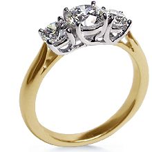 three stone diamond ring in yellow gold