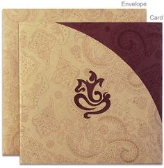 two cards with an ornate design on the front and back, both in gold and maroon