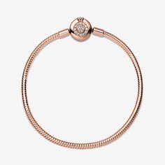 Bring some sparkle to every moment with the Pandora Moments Sparkling Crown O Snake Chain Bracelet. Hand-finished in 14k rose gold plating, the bracelet's clasp features the iconic Pandora crown O monogram and bead-set clear cubic zirconia pavé, while the snake chain brings a chic and modern touch to your wrist. Stack it with other bracelets and load it up with favourite charms for a piece you'll reach for over and over. - Pandora Moments Sparkling Crown O Snake Chain Bracelet - 14k Rose gold-pl O Monogram, Wrist Stack, Pandora Rose, Bracelet Pandora, Silver Bracelets For Women, Snake Chain Bracelets, Pandora Bracelet Charms, Mesh Bracelet, Bead Set