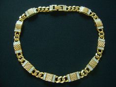 "Charming Minimalist Simple Yet Fashionable and Look Rich Vintage-Modern Bijoux D'Orlan Jewellers From Toronto Canada Circa 1990's Rich Color 22K Gold Plated Cuban Link Panel Necklace Accented With Sparkling Crystal Rhinestone Very Elegant and In Pristine Vintage Condition Like NEW and It Looks Like Real GOLD Necklace measures from end to end is 15-1/2\" long by 1/2\" wide, It weight 79.6 grams. It is signed/stamped D'ORLAN on the clasp. For more brand names of vintage jewelry and accessories pl Gold Rhinestone Necklace With Chain For Formal Occasions, Gold Rhinestone Chain Necklace For Formal Events, Formal Gold Rhinestone Chain Necklace, Real Gold Necklace, How To Look Rich, Gold Chain Jewelry, Cuban Link Chain, Cuban Link, Vintage Modern