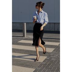 This skirt is designed in a classic pencil silhouette ideal for the office or after-hours events. Made from english non-stretchy wool-blend fabric, it sits on the waist. Has front side slit for more feminine look. Wear it with blazers, turtleneck, silk blouses or cotton shirts. Concealed zip fastening along back.  Has slim silhouette, those who are between sizes should take the next size up. Midi-length, designed to be worn at the waist Concealed zip fastening at back Side slit Length: 73cm with Midi Office Skirt, Medium Black Skirt Outfit, Poses In Pencil Skirt, Work Events Outfits, Outfits With Black Pencil Skirt, Work Pencil Skirt Outfit, Business Casual Long Skirt, Black Silk Skirt Outfit Work, Black Midi Pencil Skirt Outfit