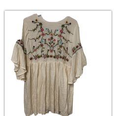 Umgee Boho Peasant Dress/Tunic Ivory With Colorful Embroidered Flowers Across Front Top & Around The Sleeves. Fully Lined. Top Back Peek-A-Boo With Button Sz S 65% Cotton / 35% Polyester **Approx** Hand Measurements Unstretched And Lying Flat: Chest: 19" Across The Front (Underarm To Underarm) Sleeve: 13" To Top Of Bell Length: 35" 0722rr0 Summer Floral Embroidered Tunic, Summer Embroidered Beige Blouse, Spring Embroidered Bell Sleeve Dress, Summer Beige Blouse With Floral Embroidery, Beige Short Sleeve Peasant Top For Summer, Spring Bell Sleeve Embroidered Dress, Folk Style Tunic For Spring, Embroidered Beige Blouse For Summer, Beige Blouse With Floral Embroidery For Summer