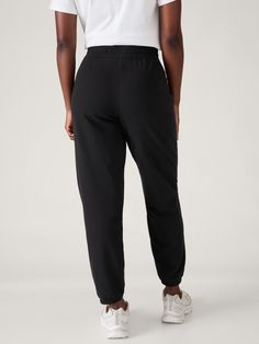 FOR: Commuting, work, and travel FEEL: Breathable cotton with a soft, terry cloth interior FAVE: Easy-access pockets to stash your essentials Semi-fitted, skims easily over the body Mid rise, sits below the natural waist Jogger has loose fit and tapered bottom Size down for a slimmer fit. Everyday Athleisure Sweats With Pockets, Comfortable Black Sweats With Pockets, Cotton Sports Sweats With Side Pockets, Cotton Sweats With Side Pockets For Sports, Black Everyday Activewear With Side Pockets, Everyday Black Activewear With Side Pockets, Sporty Sweats With Side Pockets For Everyday, Sporty Everyday Sweats With Side Pockets, Comfortable Everyday Activewear With Pockets