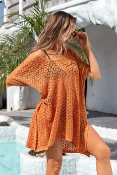 Get ready to slay the beach style game with this Sunsets Ombre Oversized Knit Sweater! Effortlessly cool and cute, this knit sweater will keep you cover-up and stylish as you watch the sun go down on the shore. Perfect for layering or lounging, it's a must-have for your beach wardrobe! Size Guide: Model is 5’8” tall, and has a 34.2” bust, 24.9”waist, & 37.7” hips. She is wearing a S / US 4 / AU 8. This sweater is true to size. Material: 100% Rayon. Key Features: V-Neckline. Short sleeve. Coverup. Crochet Perforated Knit. Not lined. Oversized fit. Maternity friendly. Care Instructions: Machine wash / Cold hand wash Beach Wardrobe, Oversized Knit Sweater, Cutout Sweater, Oversize Knit, Oversized Knitted Sweaters, Daily Dress, Beach Covers, Beach Style, Ghana